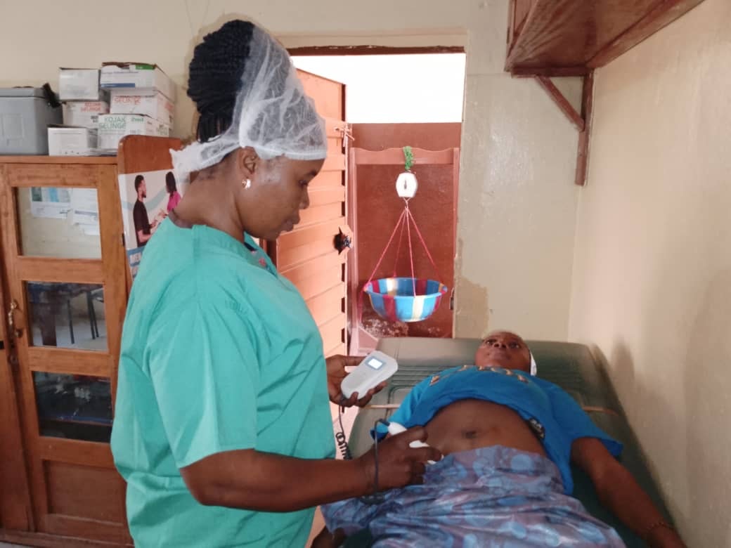 Black African female midwife in prenatal consultation with pregnant woman at the NarSarah Clinic